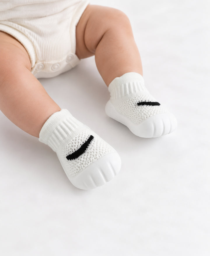 Chaussons chaussettes bébé en maille semelle épaisse